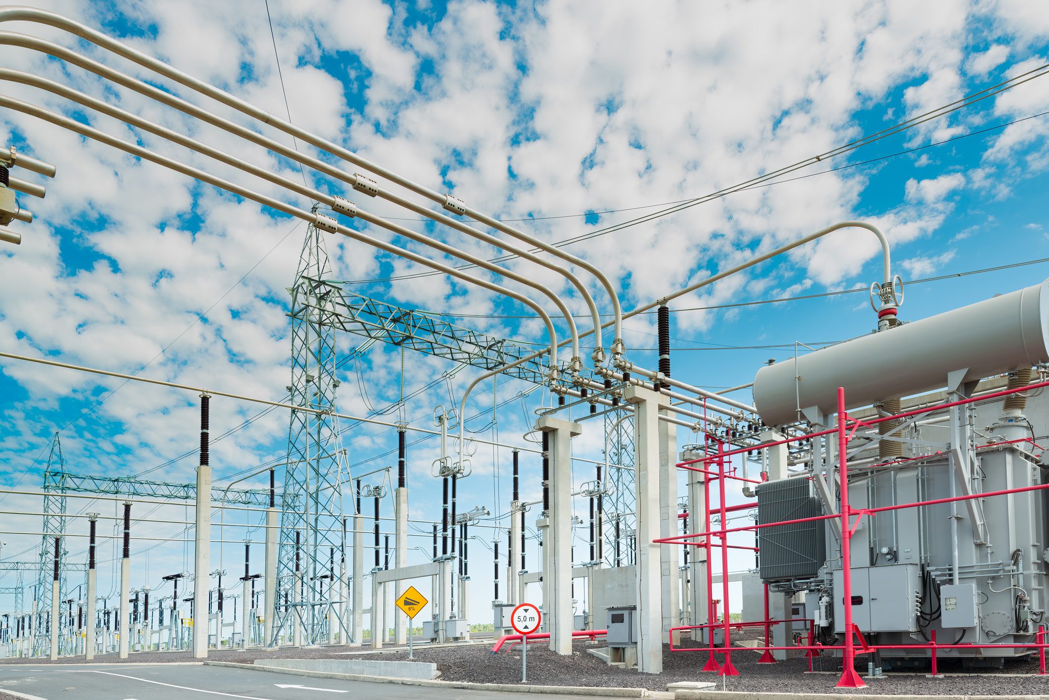 Electrical substation with blue sky background.